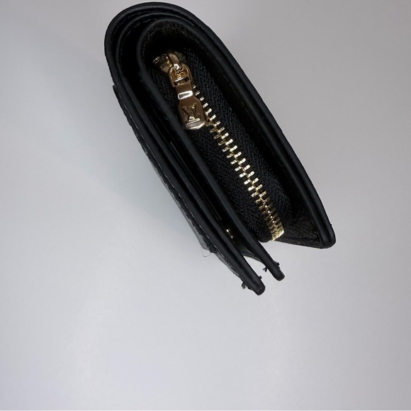 Louis Vuitton Black Embossed Monogram Wallet - Picture 6 of 7